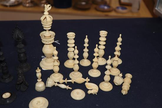 A 19th century Indian stained and natural ivory part chess set